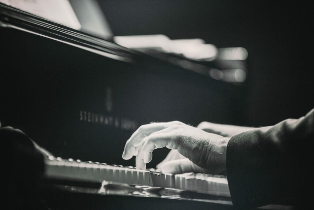 Black and white image of a performer playing Sergei Prokofiev's music